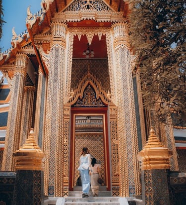 man and woman standing in front of brown concrete building during daytime