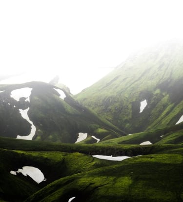 green mountain under white sky during daytime