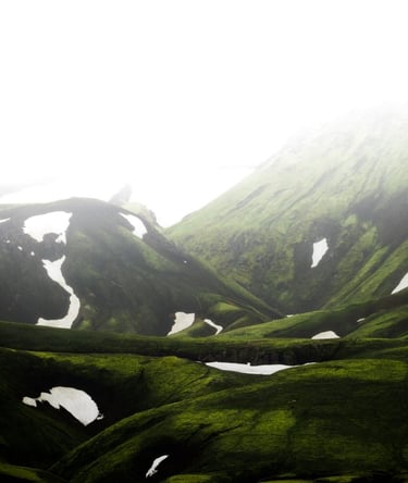 green mountain under white sky during daytime