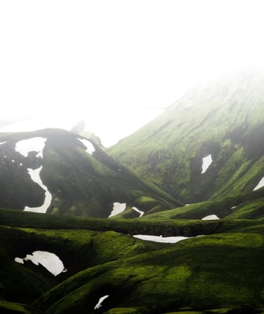 green mountain under white sky during daytime