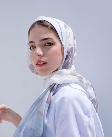 woman in white hijab smiling