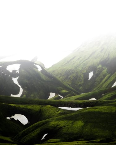 green mountain under white sky during daytime