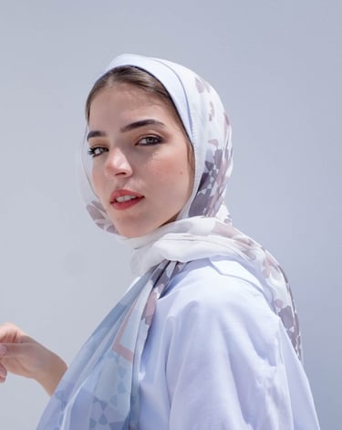 woman in white hijab smiling
