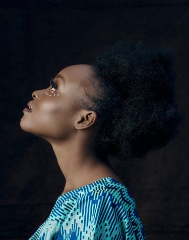 woman in blue and white shirt