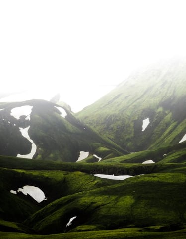 green mountain under white sky during daytime