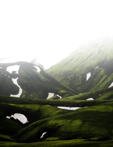 green mountain under white sky during daytime