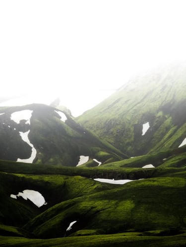 green mountain under white sky during daytime