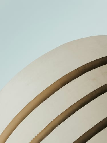 woman standing in front of white building