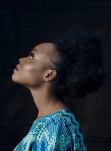 woman in blue and white shirt