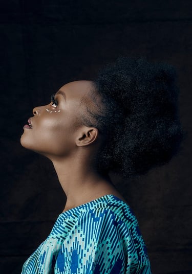 woman in blue and white shirt