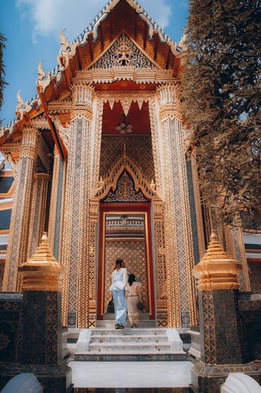 man and woman standing in front of brown concrete building during daytime