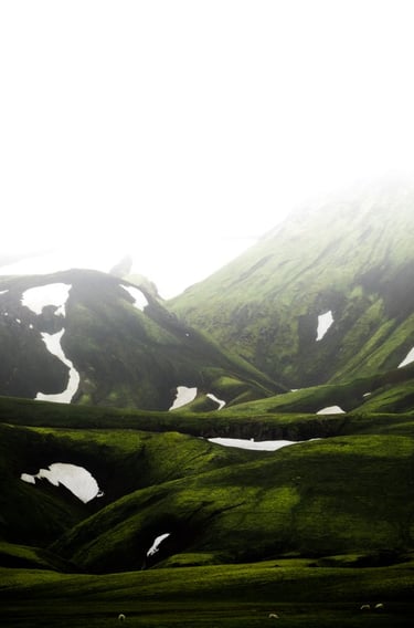 green mountain under white sky during daytime