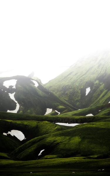 green mountain under white sky during daytime