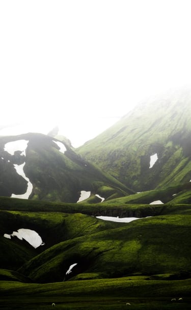 green mountain under white sky during daytime