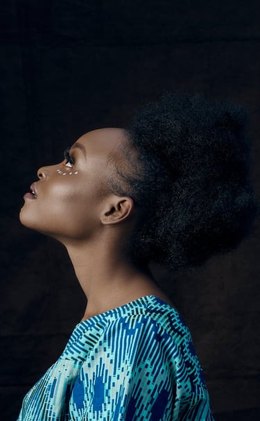 woman in blue and white shirt