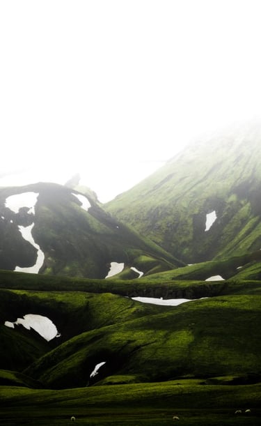 green mountain under white sky during daytime