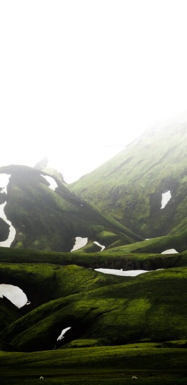 green mountain under white sky during daytime