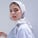 woman in white hijab smiling