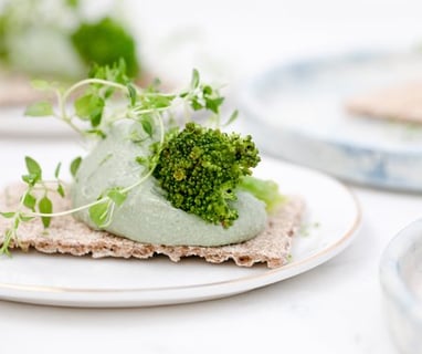 green vegetable on white ceramic plate