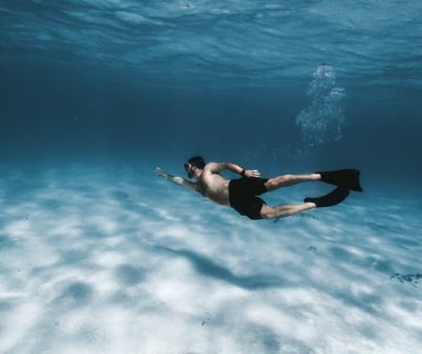 woman in black bikini in water