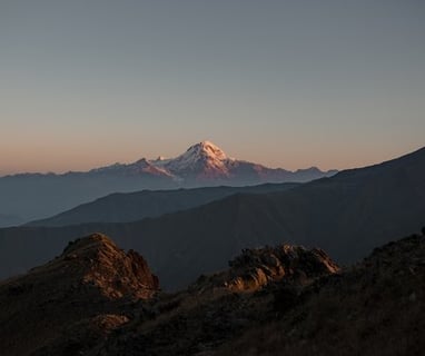 brown mountain under white sky during daytime