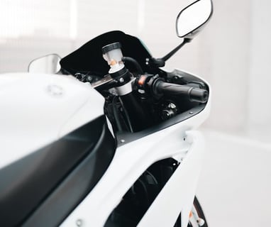 white and black sports bike