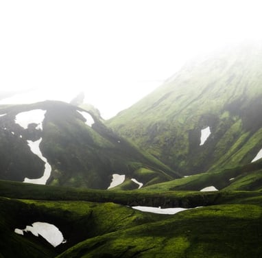 green mountain under white sky during daytime