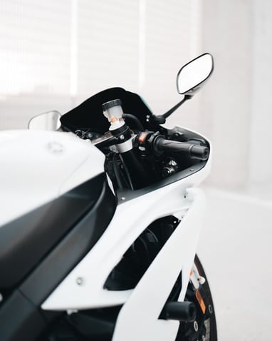 white and black sports bike