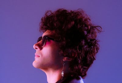 woman in black shirt wearing sunglasses