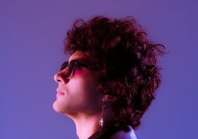woman in black shirt wearing sunglasses