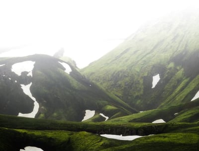 green mountain under white sky during daytime