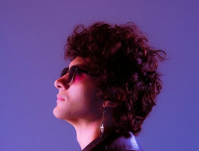 woman in black shirt wearing sunglasses
