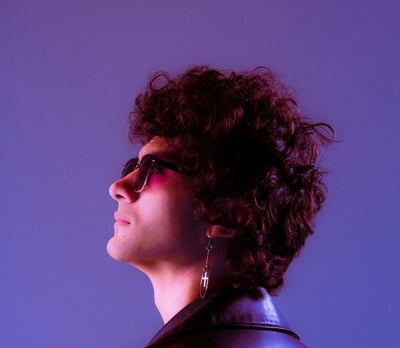 woman in black shirt wearing sunglasses