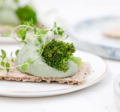 green vegetable on white ceramic plate