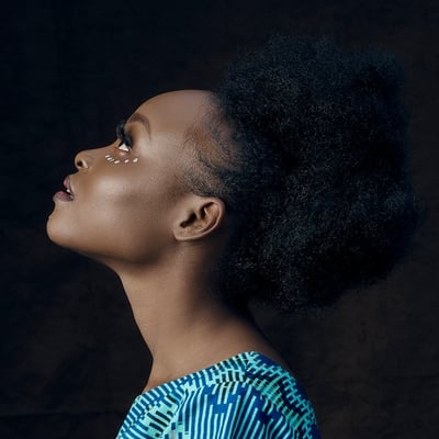 woman in blue and white shirt