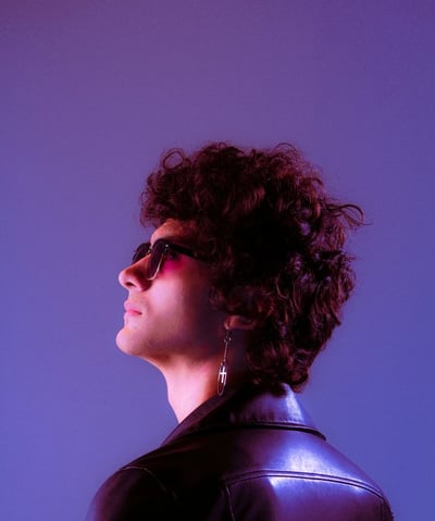 woman in black shirt wearing sunglasses