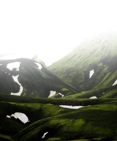 green mountain under white sky during daytime
