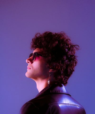 woman in black shirt wearing sunglasses