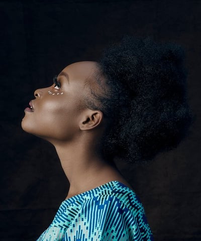 woman in blue and white shirt