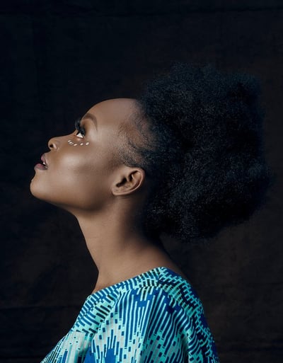 woman in blue and white shirt