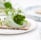 green vegetable on white ceramic plate