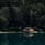 brown wooden house on lake