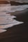 ocean waves crashing on shore during daytime