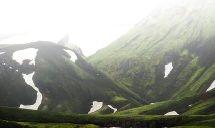 green mountain under white sky during daytime