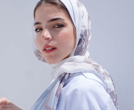 woman in white hijab smiling