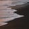 ocean waves crashing on shore during daytime