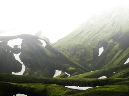 green mountain under white sky during daytime