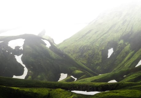 green mountain under white sky during daytime