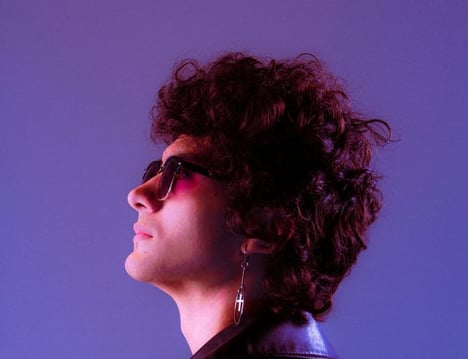 woman in black shirt wearing sunglasses