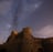 brown concrete building under starry night